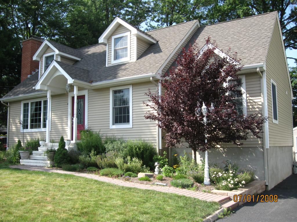 One of a kind! Charming 2 story home. Completely renovated with every upgrade. Approximately 0.21 acre(s), Year Built: 1949, Completely Renovated 2006.Charming two story, totally renovated and expanded, Single Family Home. Includes 4 spacious Bedrooms with walk-in closets in each, 2.5 beautifully tiled Baths, Living room with floor-to-ceiling fireplace. Immaculate Kitchen with custom cabinets, granite counter tops, and "top-of-the-line" stainless steel appliances, including "dual fuel" convection oven/range and built-in microwave. Washer/Dryer. Dining area with cathedral ceiling, Den/Office on first floor (or 5th Bedroom). Beautiful Master Bedroom is located on first floor and has two walk-in closets, French doors to sun-deck.