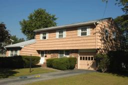 Delightful Colonial,Well Maintained &amp; nicely situated on Corner Lot featuring Spacious Rooms,Open Airy Floor Plan,4 Bdrms,2.5 Bths,LR,FDR,EIK,FR,Hrdwd Flrs, Full Basement, 1 Car Garage, Great 