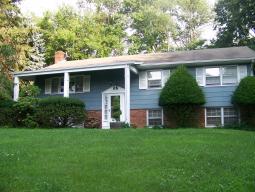 PRIVATE PARK-LIKE SETTING IN DESIRABLE NEIGHBORHOOD.  THIS WELL MAINTAINED HOME BOASTS HARDWOOD FLOORS THROUGHOUT, NEUTRAL DECOR WITH CUSTOM WAINSCOTING AND CHAIR RAIL MOULDINGS, BRICK FIREPLACE COMPLETES THE FAMILY ROOM. DON'T MISS THIS OPPORTUNITY! TAXES BEING APPEALED, REDUCTION IS SUBSTANTIAL!