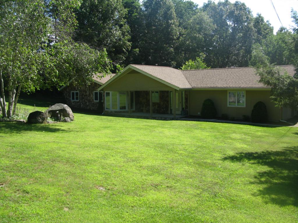 Spacious Ranch with open floor plan, DR offers built-ins, GR with wainscoting and built-ins. Freshly painted interior, new carpets in the hall and bedrooms.  Heated 40x20 in-ground Grecian pool. Entrance vestibule, cement covered front porch, secluded yard, cabana room off GR for pool. Fireplace in LR-Easy Living.