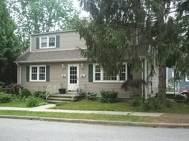 RARE TWO-FAMILY HOME IN POMPTON LAKES! 1st unit features large kitchen w/ seperate DA, LR, 2 BR, FB, H/W , basement w/ BR, rec rm, laundry &amp; storage rm. 2nd unit: 2 BR, kitchen, LR, FB. Other features include 50 x 150 corner lot, newer siding and window, and large fenced yard.