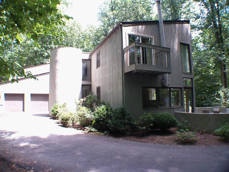 Unique 5 BR, 3 1/2 bath "Trombe" passive solar contemporary home designed by renowned architect Harrison Fraker. Located in a quiet and desirable Princeton Township neighborhood on over 2 acres. 