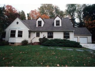 Grandeur awaits you. Large rooms, beautiful hardwood floors, tons of closets and storage, brick FPL in LR, Stone Fp in FR. frenchdoors to porch. Much Potential 