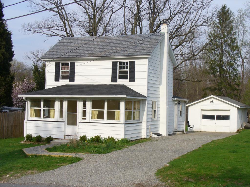 Exceptional opportunity! Renovated for you to move right in and enjoy! Large rooms, fabulous kitchen, many updates! See Add'l Remarks for more! Enclosed heated four-seasons room, hardwood floor and stainless steel sink in kitchen. Newer carpeting, updated electric, plumbing, windows and doors. Large, deep yard and patio. Garage, storage shed. Oil tank in basement. Move-in condition!