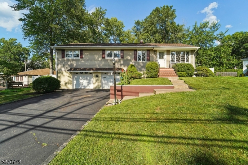 Welcome home to this charming 3 bedroom 2 bathroom Ranch nestled on a generous, level lot.