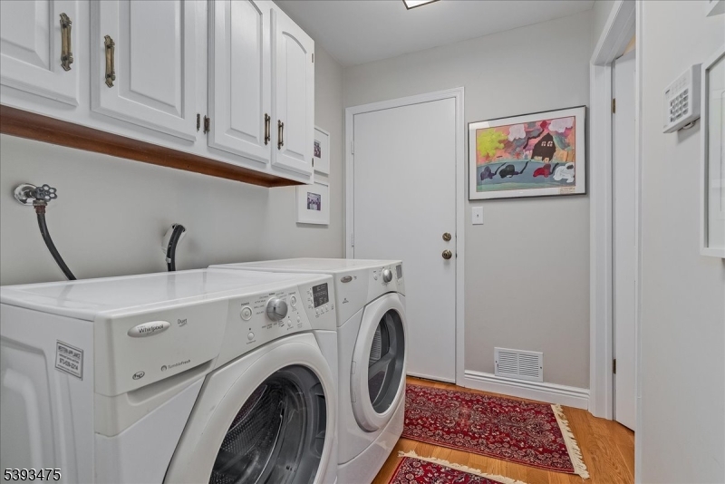 Large Laundry Room direct access to garage and basement