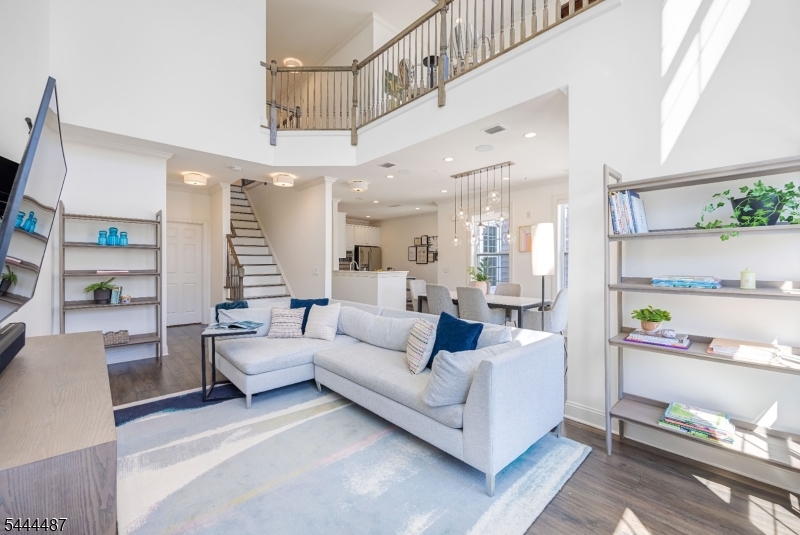 Living Room And Upstairs Loft