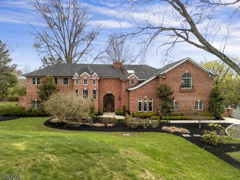 This beautiful home is on 3 lush acres of manicured lawn, garden areas and patios.