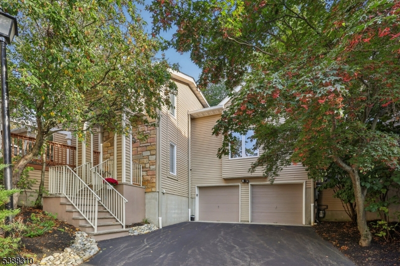 Front of Home w/ 2 car garage