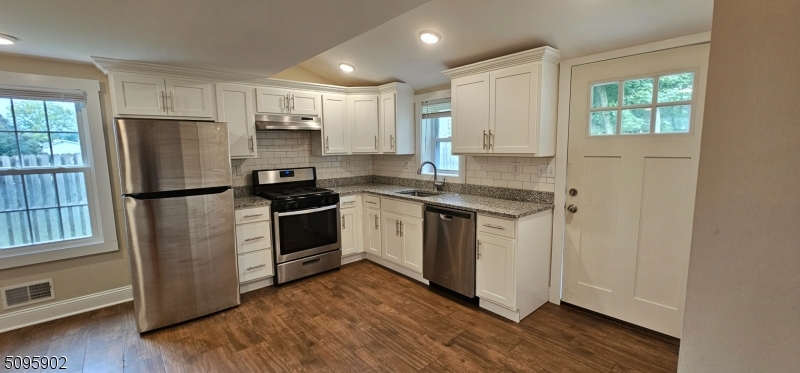 Kitchen White cabinets, granite & stainless steel appliances including a dishwasher make this kitchen a dream!
