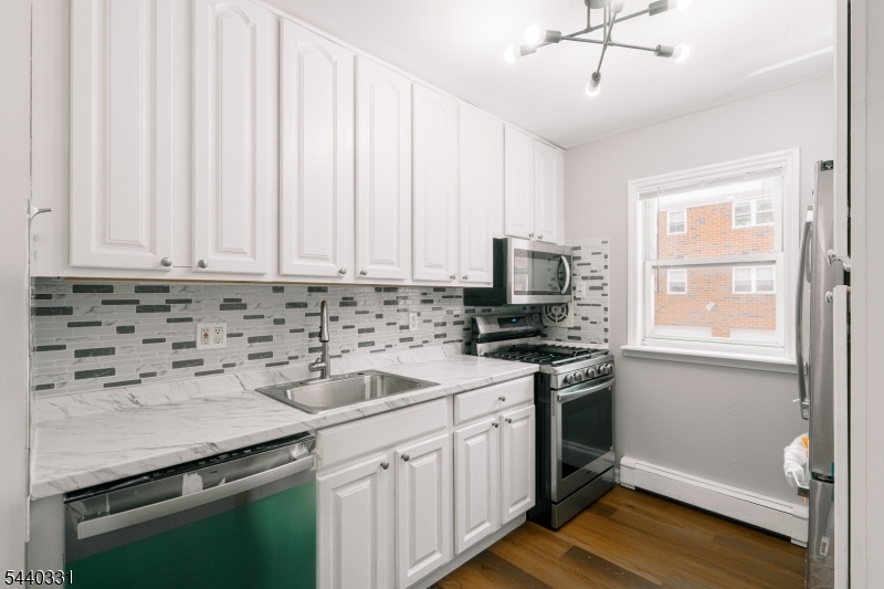 Updated Kitchen New countertops and appliances.