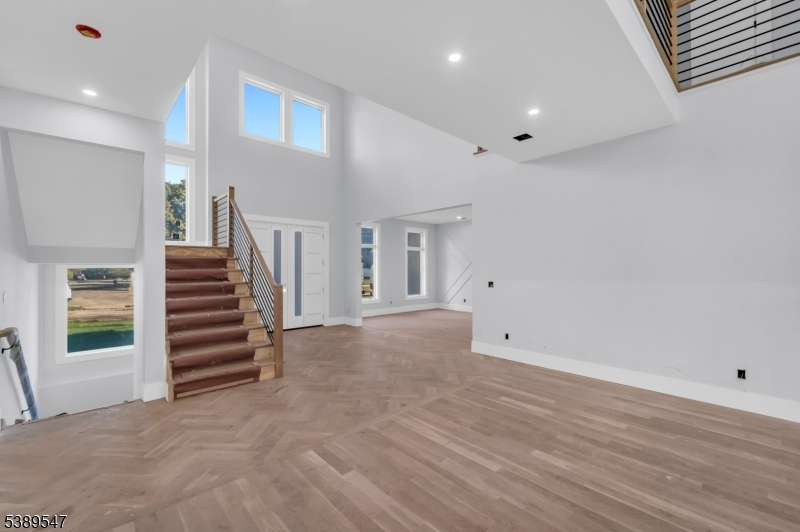 White oak, wide plank hardwood flooring.