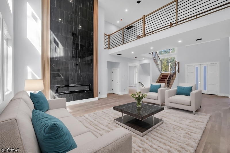 2-Story Great Room with Marble Fireplace