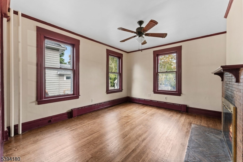 Living Room Large windows allow for rooms to be bathed in natural light.