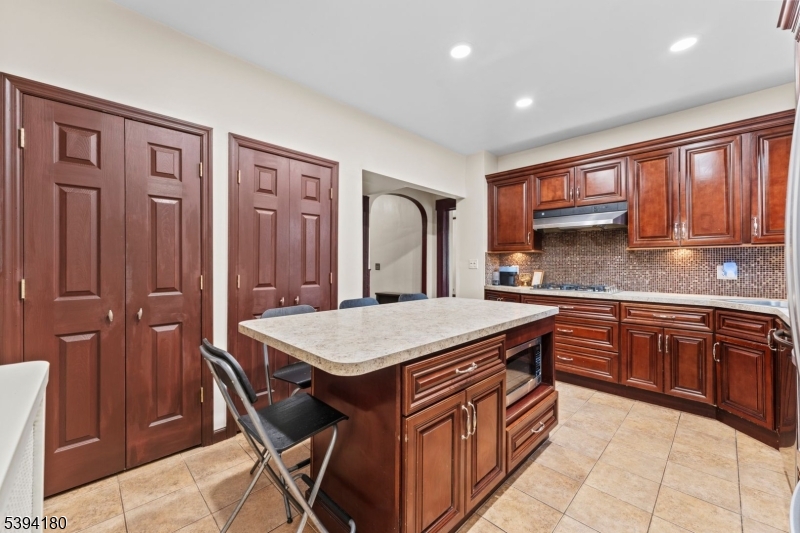 Kitchen Double Walk-in pantries lots of storage.