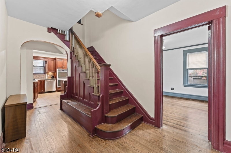 Front Beautiful millwork details including a built -in bench with storage for hats and mittens.
