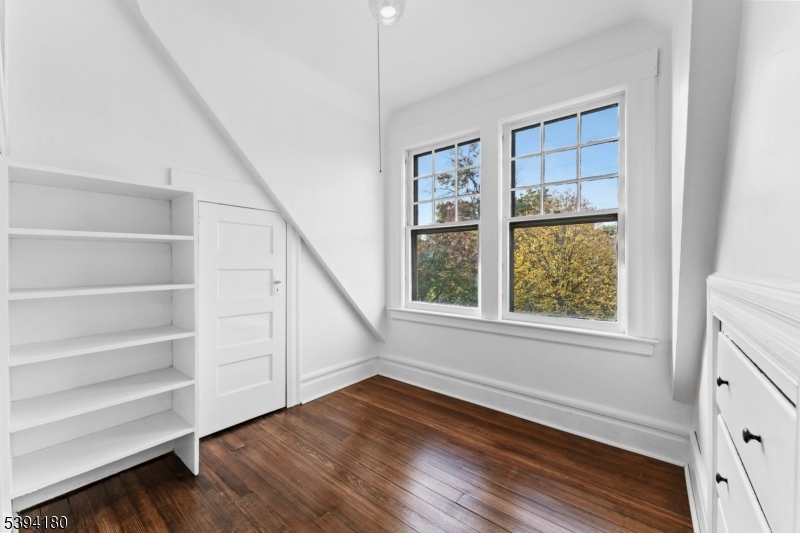 Front Enjoy views of treetops! 3rd floor flex space, office, yoga or craft room.