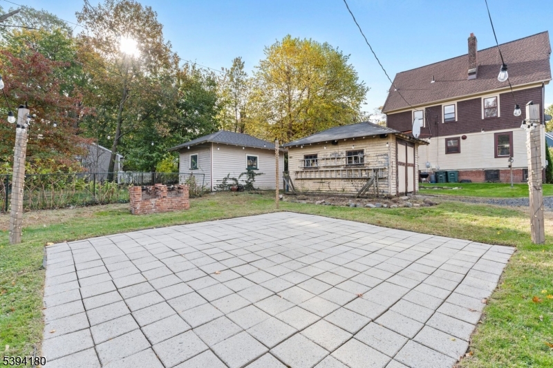 Backyard Patio with outdoor lighting.