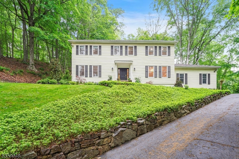 3 private acres in sought-after Bradford Estates!  Tranquil sunrises & seasonal views! Updated EIK & hardwoods!  Finished basement for your dream gym/lounge!  Next-level landscaping & privacy! Close to NYC trains, top schools, restaurants and Morristown.