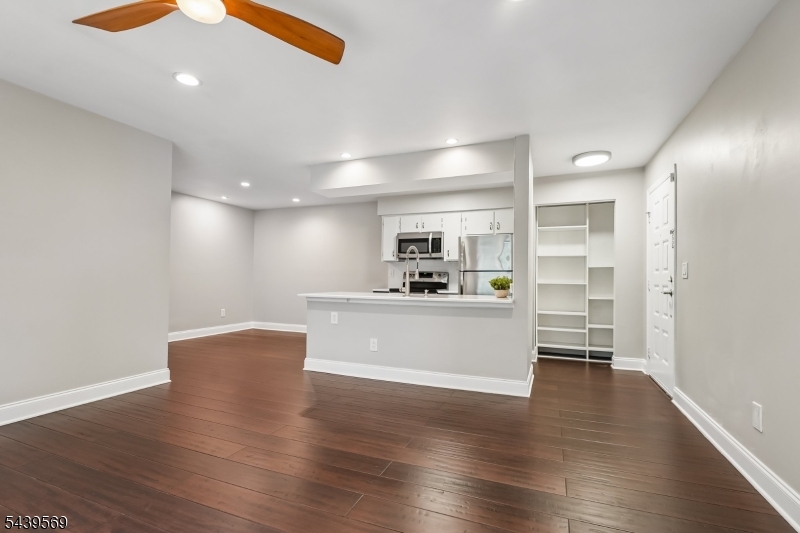 The Open Living Area Flows Seamlessly Into the Kitchen and Dining Spaces