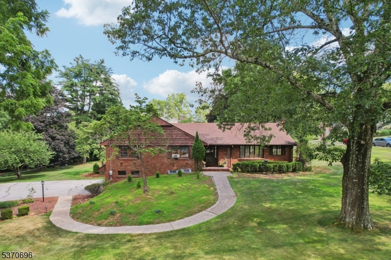 Welcome home to this beautifully maintained 3 bedroom 3 bathroom all brick custom Ranch.