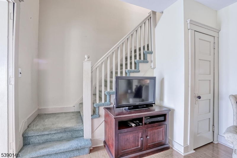 Stairs to the bedrooms & bath