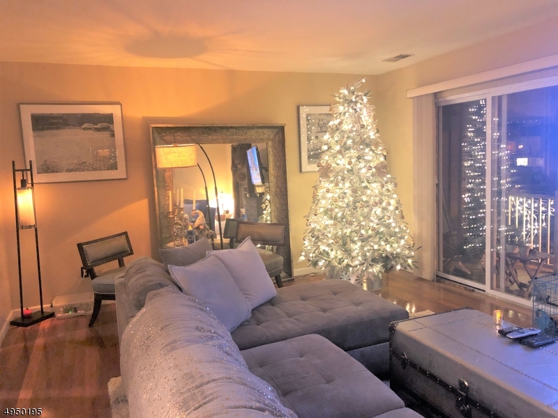 Large room with hardwood and great light.