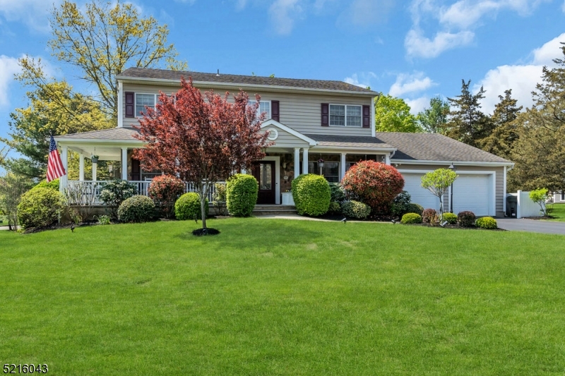 Corner lot, wrap around porch, just about an acre