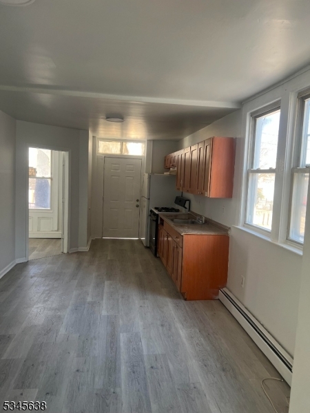 Step into this 1 bedroom 1 bathroom first floor unit to discover the eat in kitchen offering cabinetry, appliances, ample counter space and a dining area.