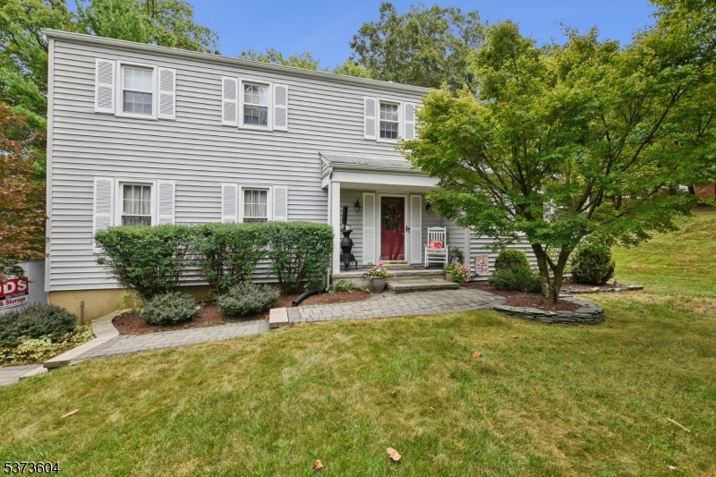 Nice curb appeal with mature landscaping.