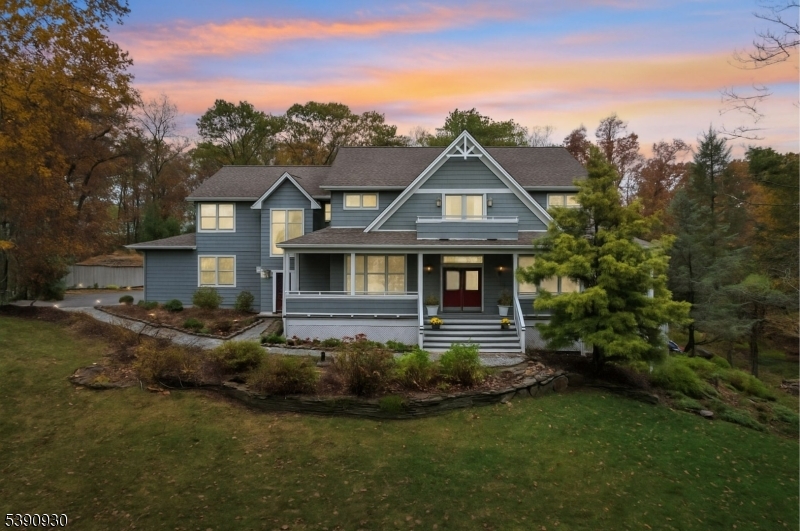 BUILT IN CABINETRY, FLOOR TO CEILING STONE FIREPLACE, A CUSTOM HOME ALL AROUND.