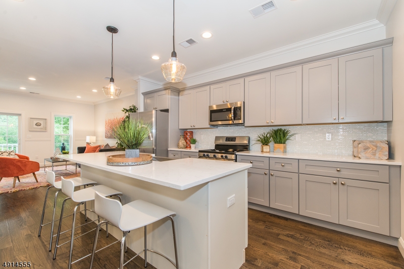 Gorgeous Kitchen Stainless Frigidaire appliances, quartz countertops, farm sink,