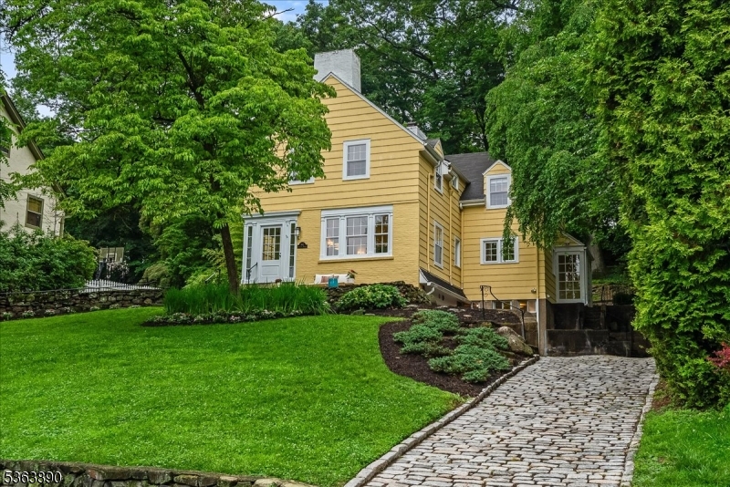 Charming home perched on the hillside of Highland Ave.