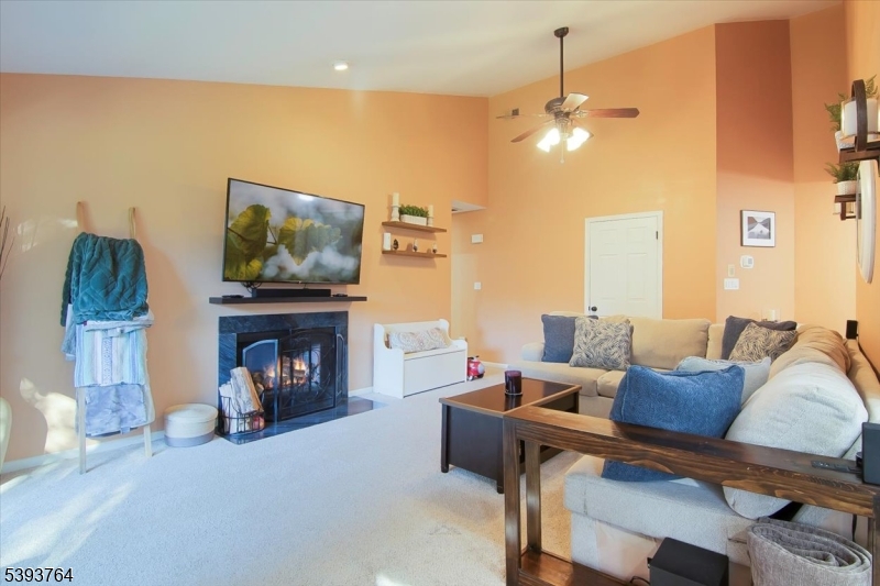 LIVING ROOM Wood-burning fireplace ready for cold winter nights!