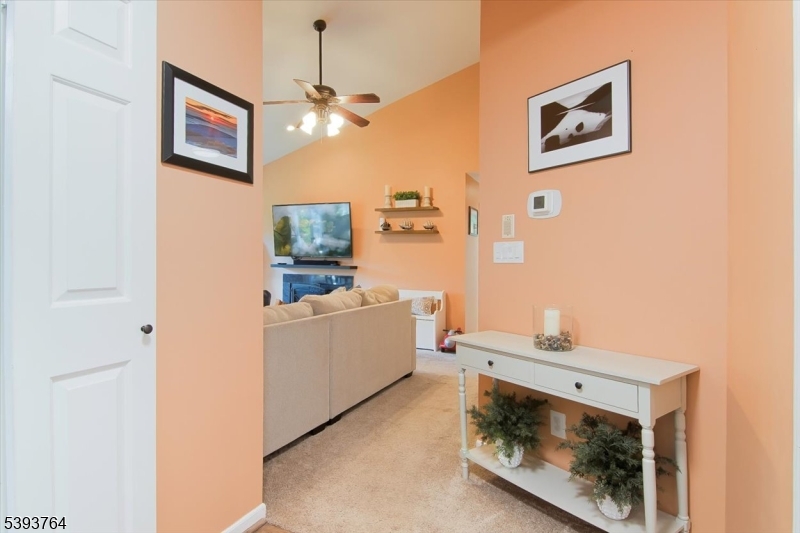 FOYER Equipped with double door closets that can be used for guest coats, groceries and storage.