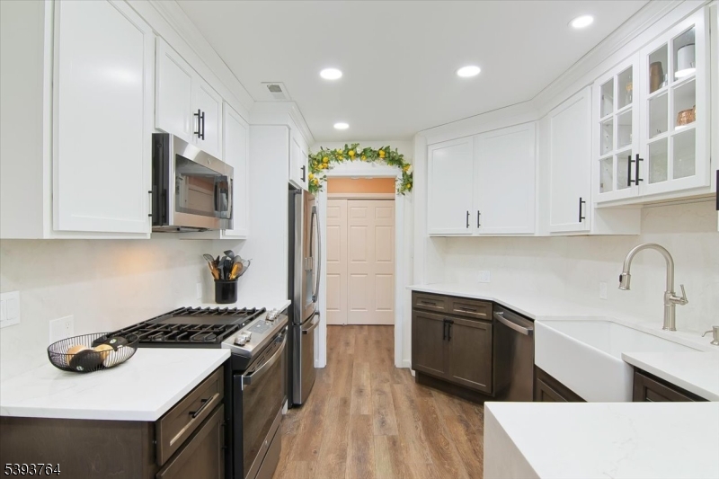 KITCHEN Brand new stainless steel appliances throughout.