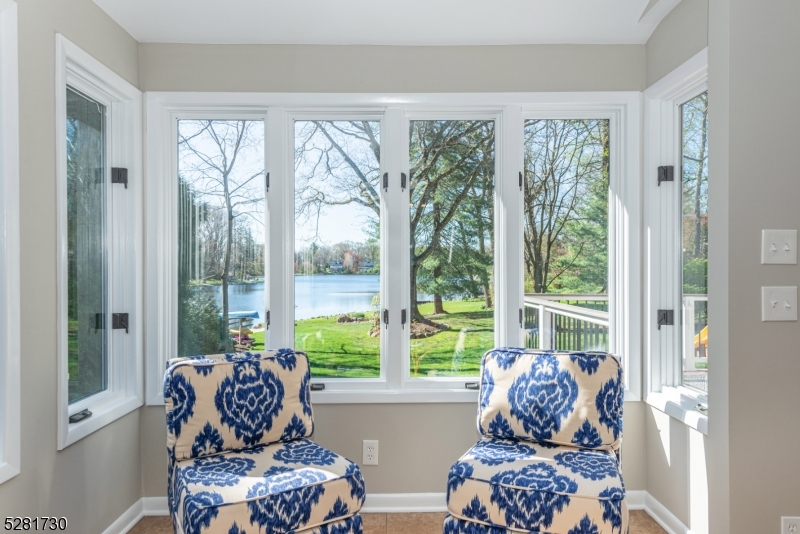 Sit and enjoy the warm sunshine filling the room while enjoying the lake view.