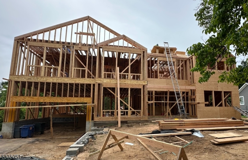 Framing in Progress as the 3 floor is being constructed to add additional finished living space including a full bath, bedroom and loft space.