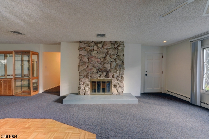 living room Living room has a wood burning fireplace.