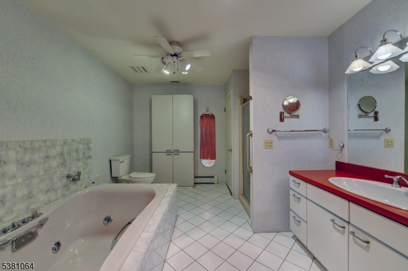 main bath Main bath has tub and shower.