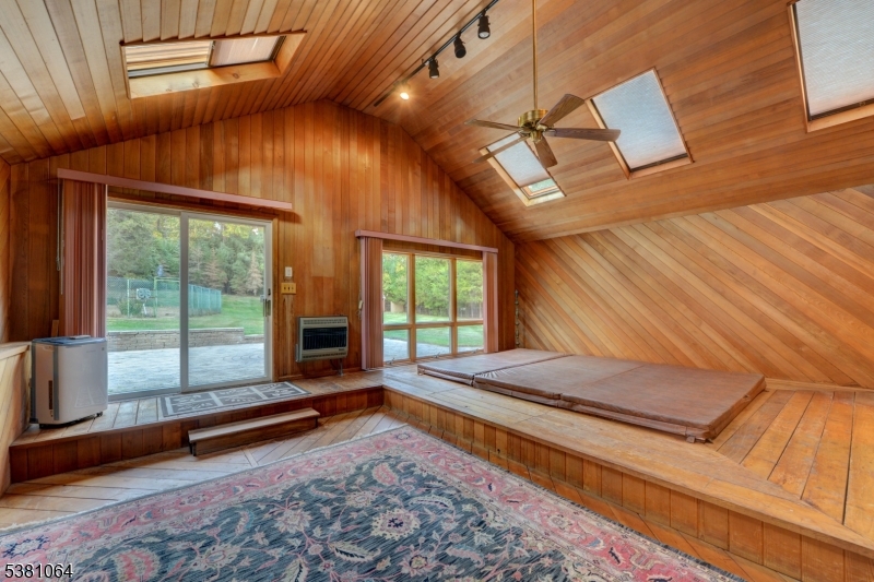 spa room Large spa room with huge jacuzzi and overhead skylights overlooking the yard.