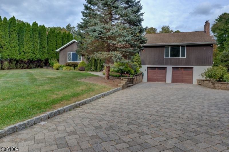 front of home and driveway Paver driveway with lots of room for parking.
