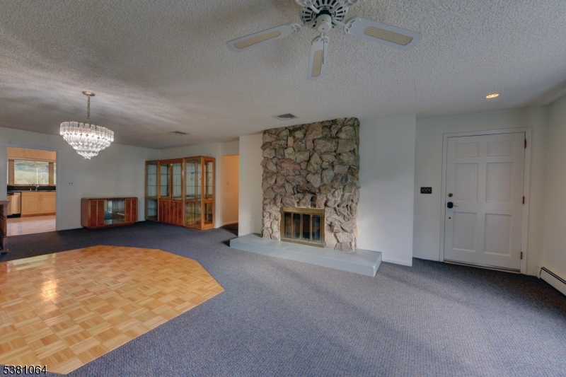 living room w fireplace Enter into spacious living room with dining area.
