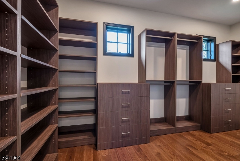 Closet Oversized Closet with Custom Built-In's