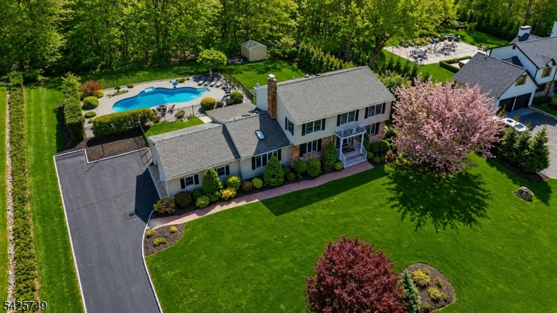 A beautifully reimagined home set on nearly an acre of private, fenced in grounds in highly sought after area of Wayne.