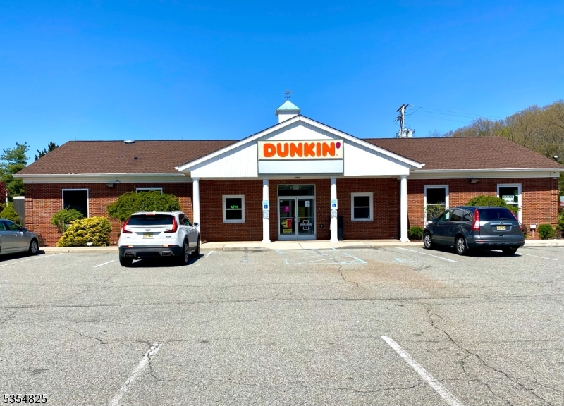 Located next to Dunkin Donuts.  Plenty of parking available