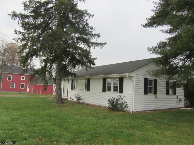 The cottage has undergone renovations with updates throughout the years. Newer Timberline Roof, AC (2 years young), fans, light fixtures, shades, basement lighting, bath shower door, refrigerator, stove and more!