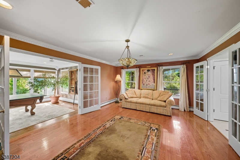 Living Room. Access to the entry way and the games room.