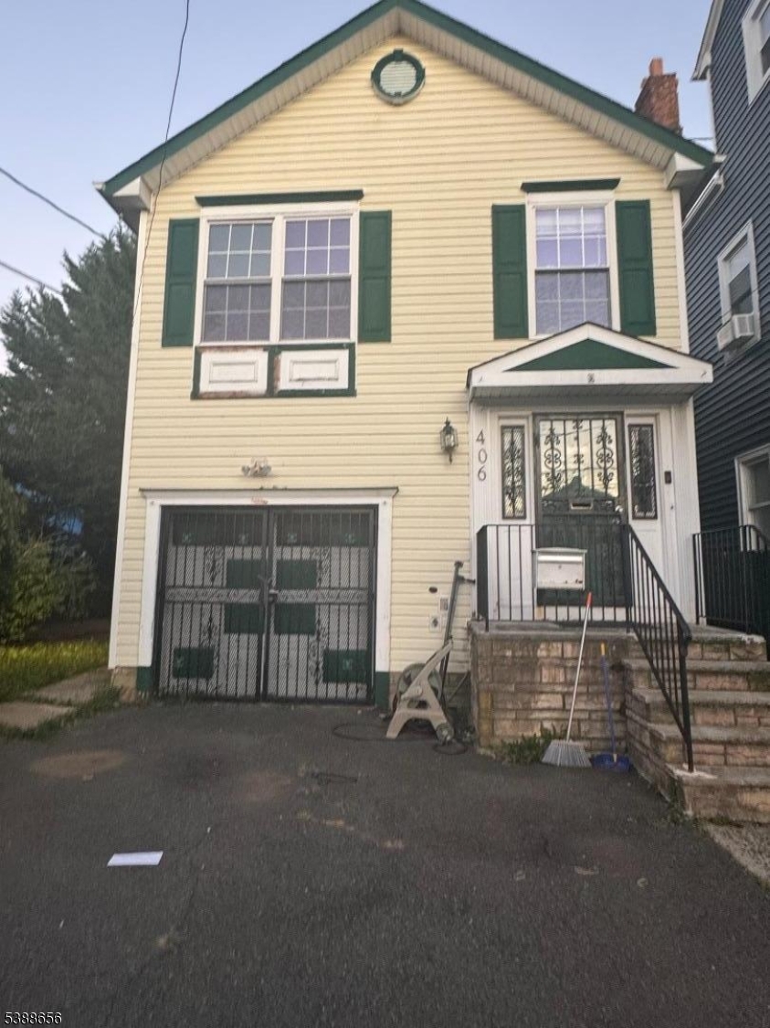 Warm and inviting home with two car shared driveway.