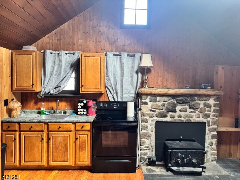 Kitchen kitchen with woodstove